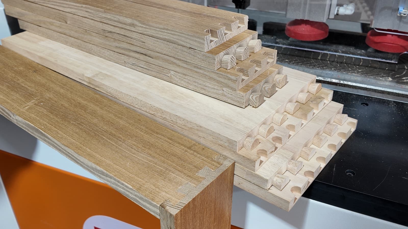 Assorted finished dovetail-jointed wood components