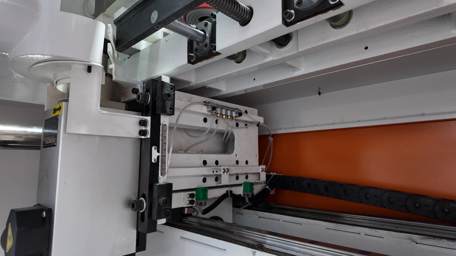 Dovetail cutting spindle mounted on the CNC X-axis carriage