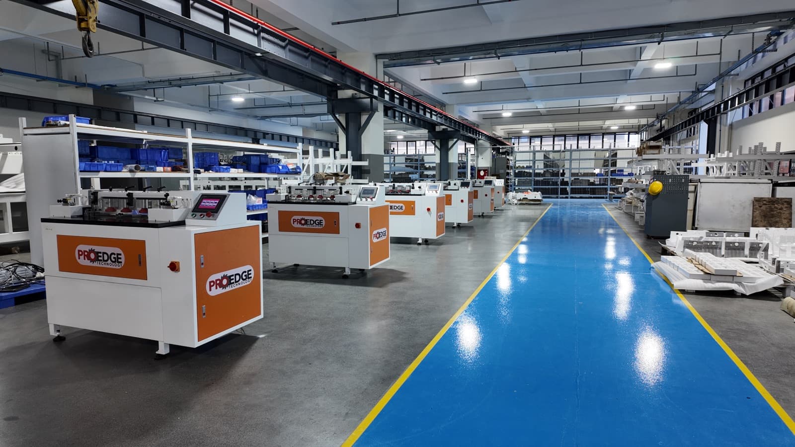 Row of Pro Edge Technology CNC Dovetail machines on the production floor