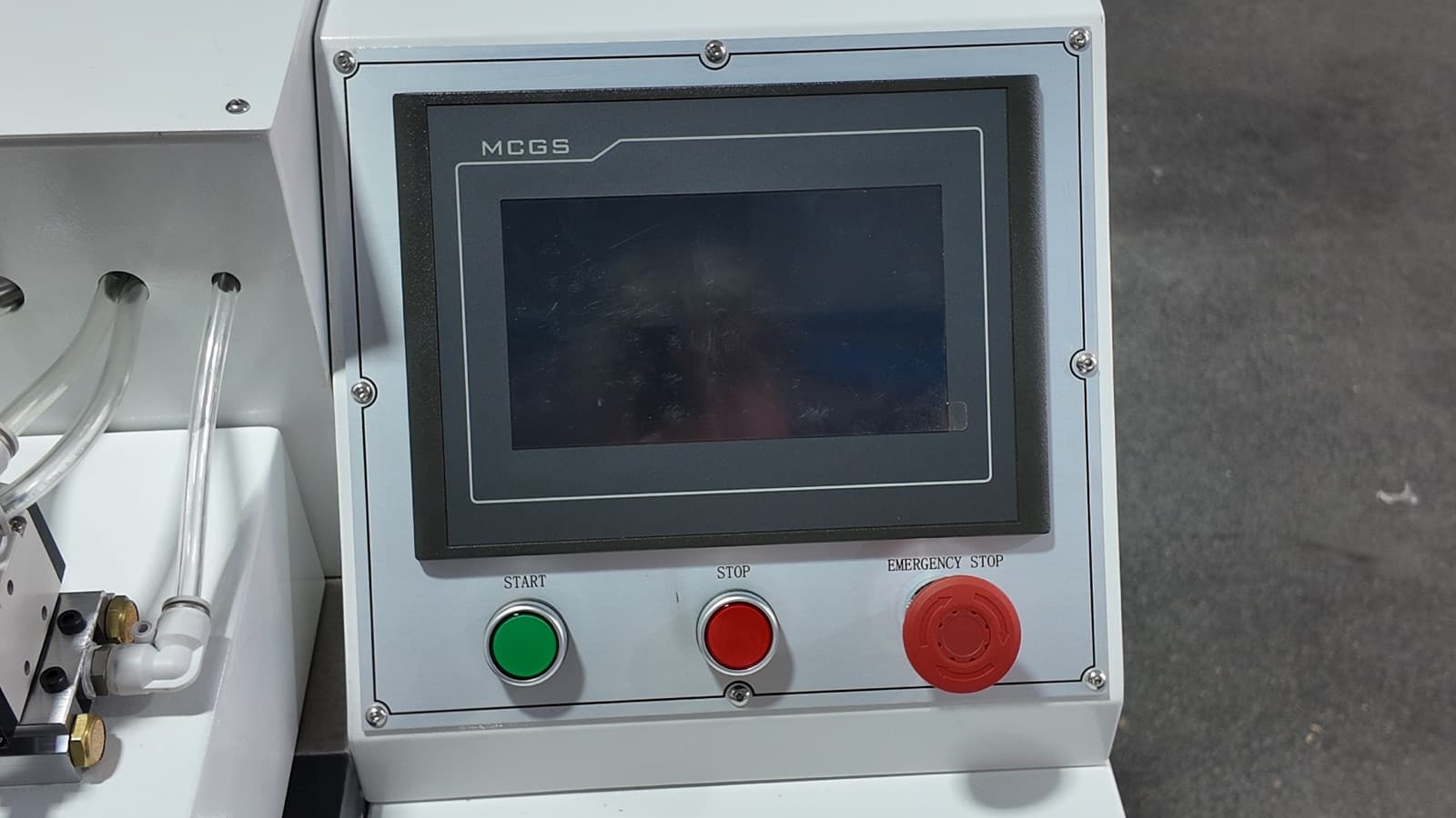 Operator touchscreen with Start, Stop, and Emergency Stop controls