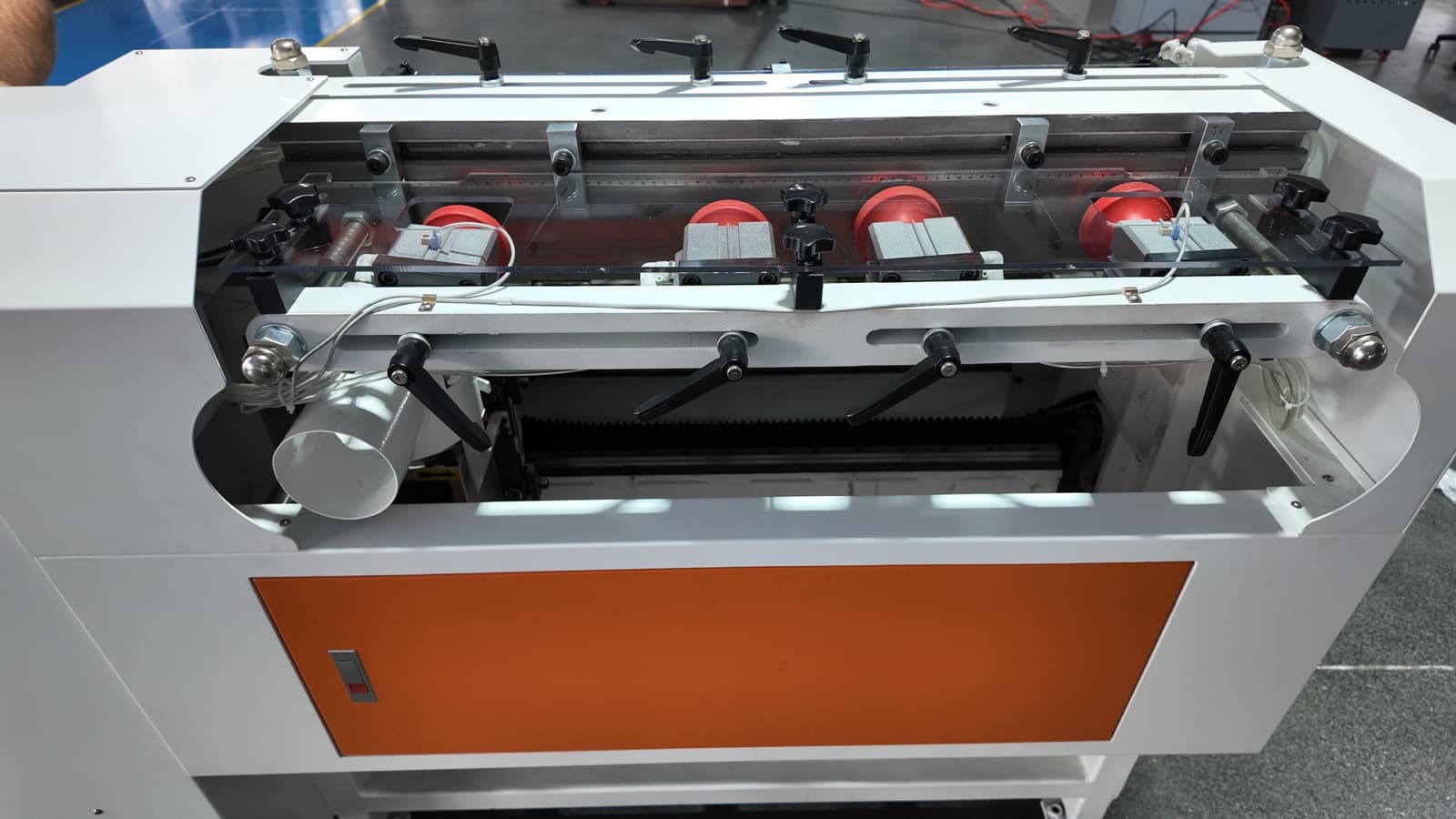 Overhead view of the vertical hold-down clamp bank