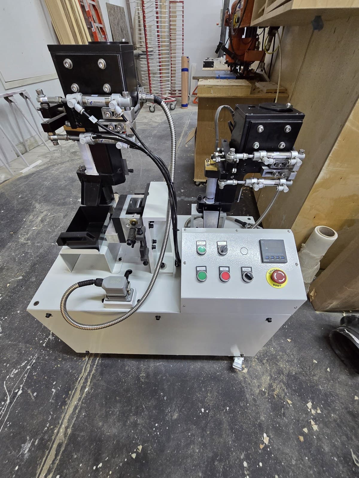 Control panel of the stand-alone glue pot station with pushbuttons and emergency stop