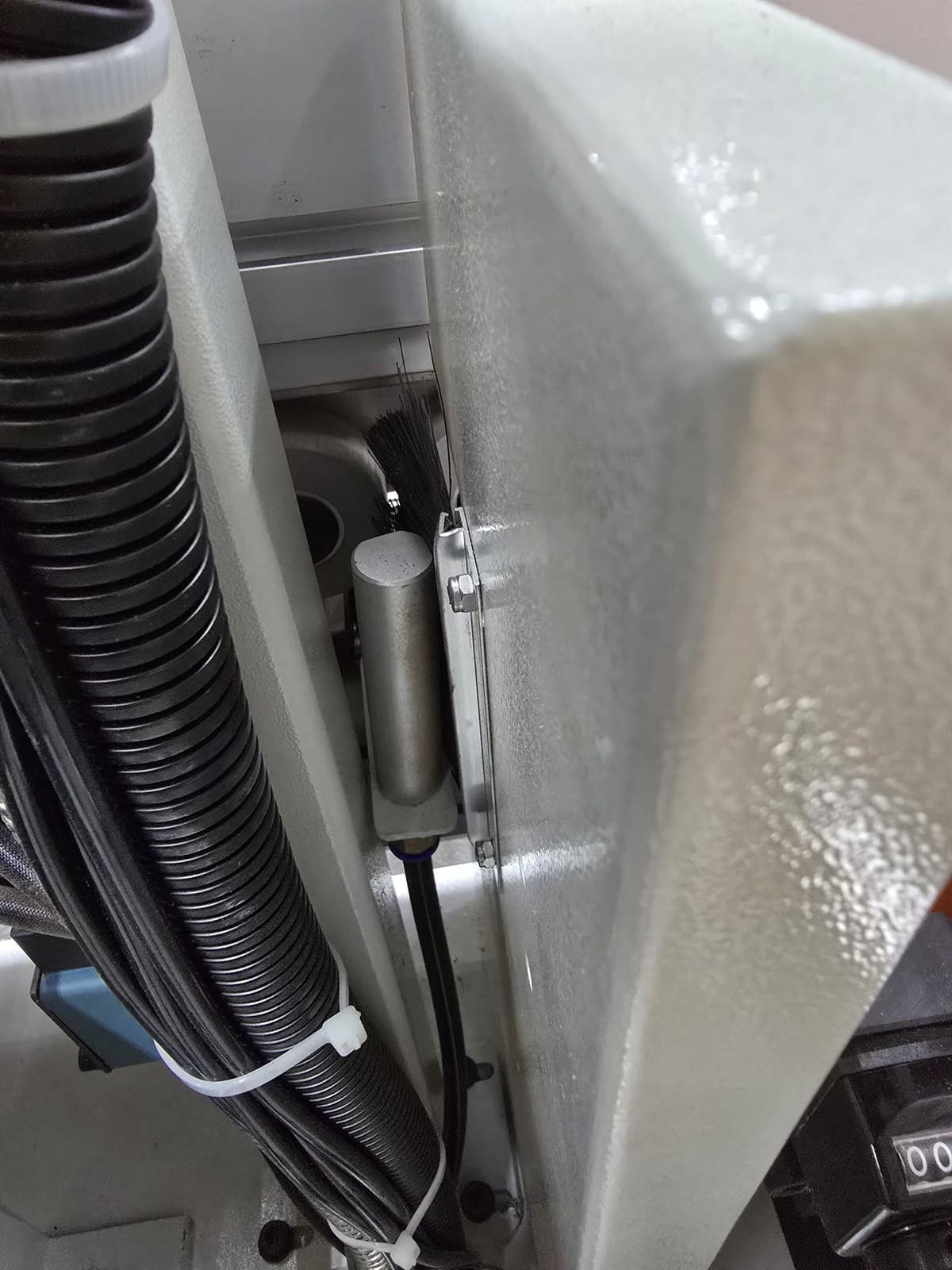 Internal station detail behind the machine guarding