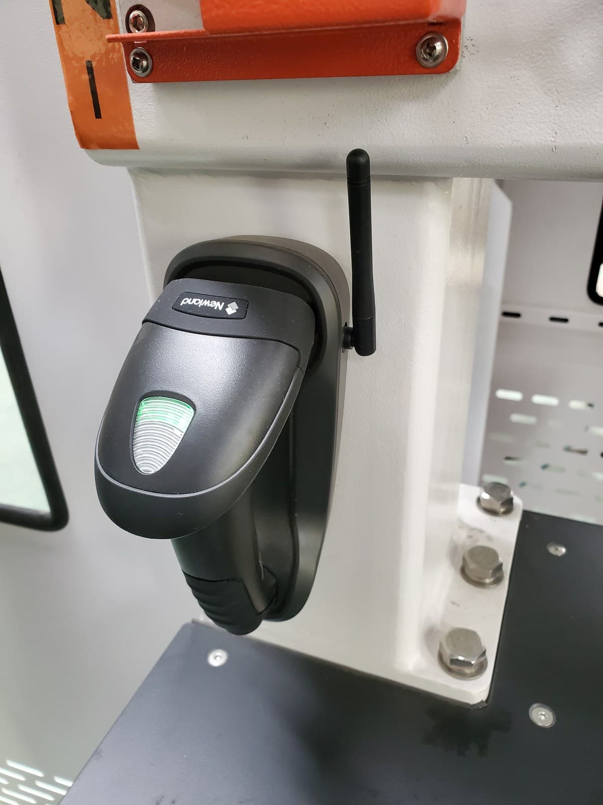 Barcode scanner mounted on the machine frame for job selection