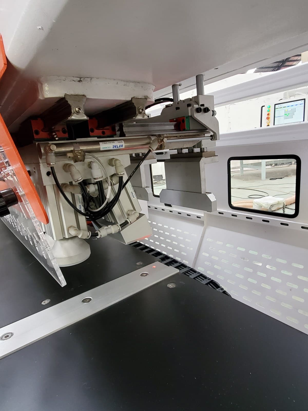 Hold-down clamp and two-position PLC-controlled fence assembly
