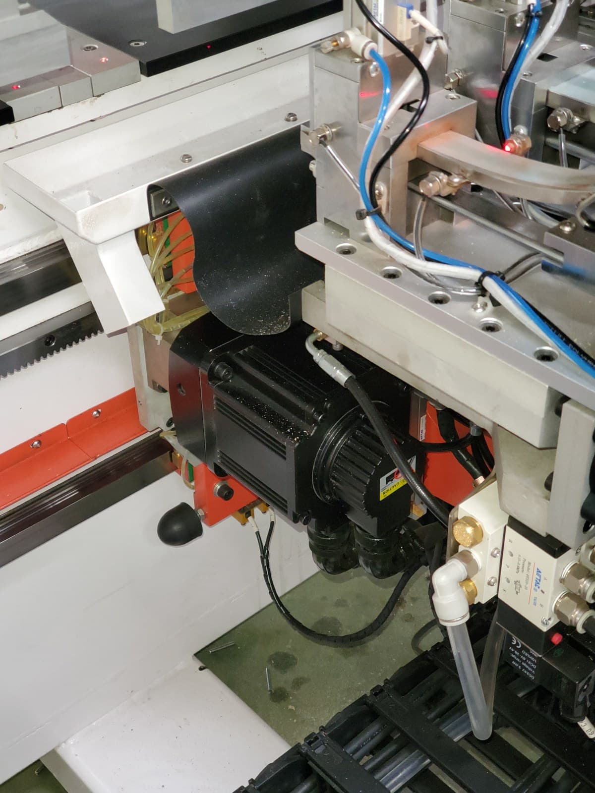 X-axis drive motor and cable management on the CNC platform